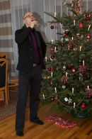 Rudolph Snose, Rudolph‘s nose might be red from wine as he is a wine merchant and loves a good drop.