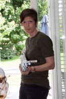 Rip Leigh, alien infestation survivor taking care of Jones, an infected cat