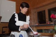 Klina serves her delicious soup.