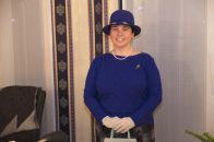 Her Magesterial, the Queen, always a stiff smile on her face.