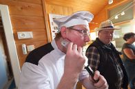 The chef knows how to handle a chopper.