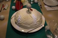 Half a buttercream golf ball.